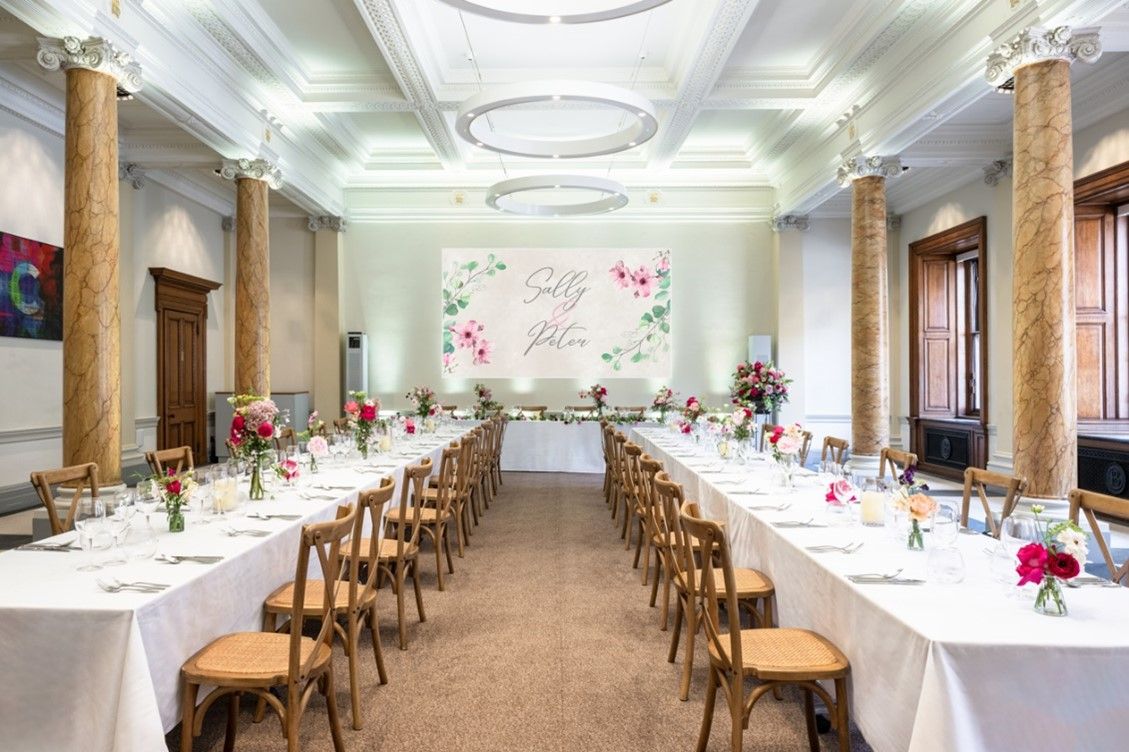 long-tables-for-wedding-reception.jpg Wedding tables set up in Science Room
