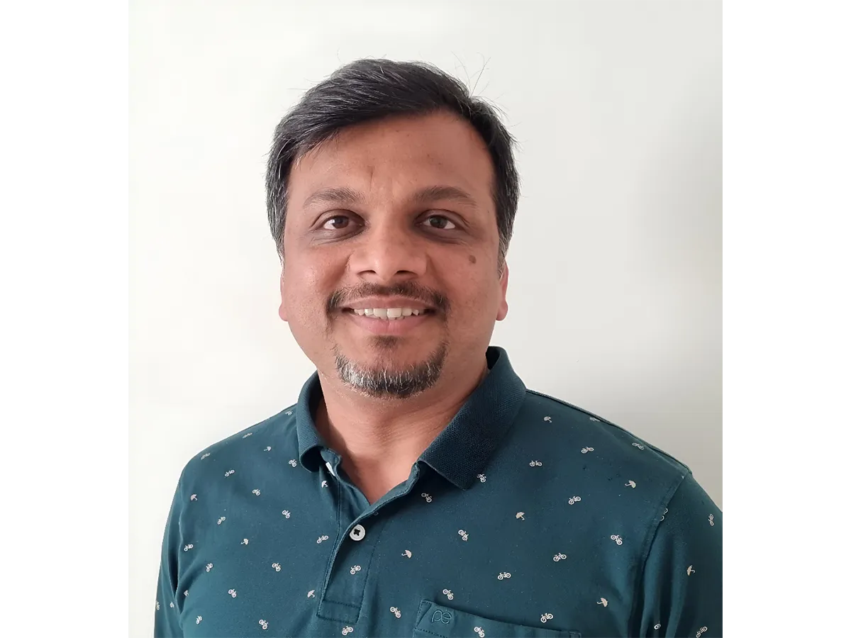 a man smiling for a picture