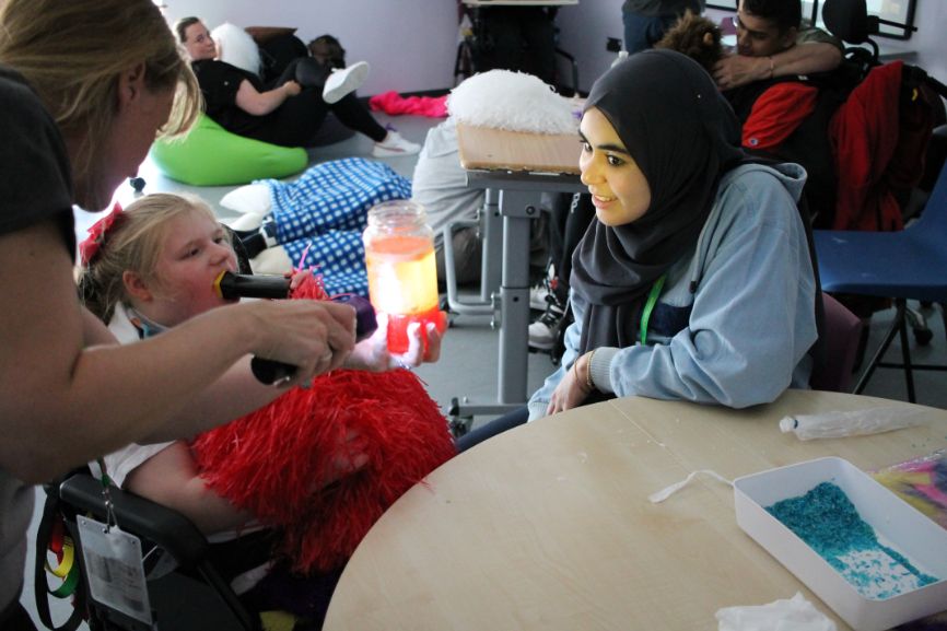 A young person enjoys a sensory experiment A young person enjoys a sensory experiment